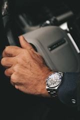 a close up of a person driving a motorcycle