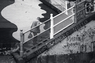 Illustration of a person climbing stairs symbolizing progress and growth.