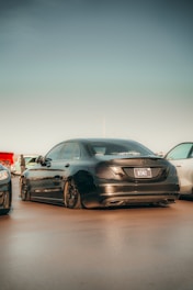 A sleek car with tinted windows showcasing a professional tinting job.