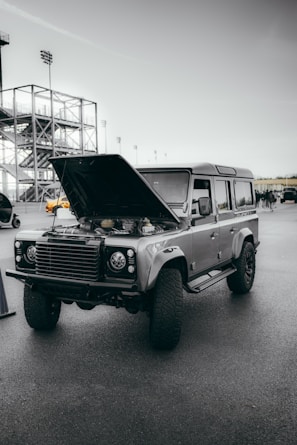 An outdoor view of a vehicle inspection in progress.