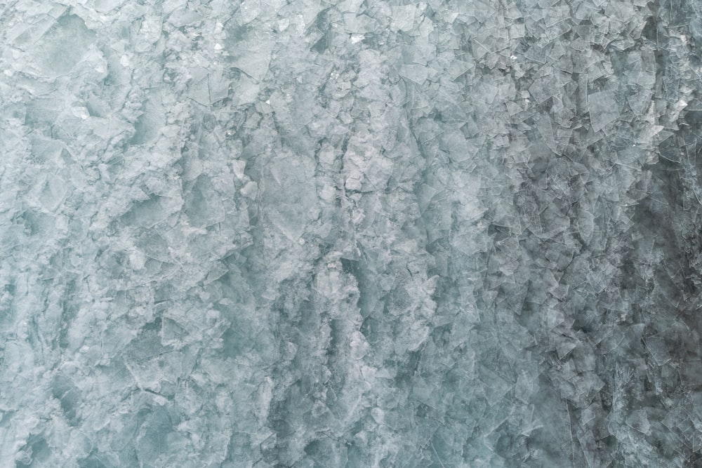 a close up view of ice on the side of a mountain