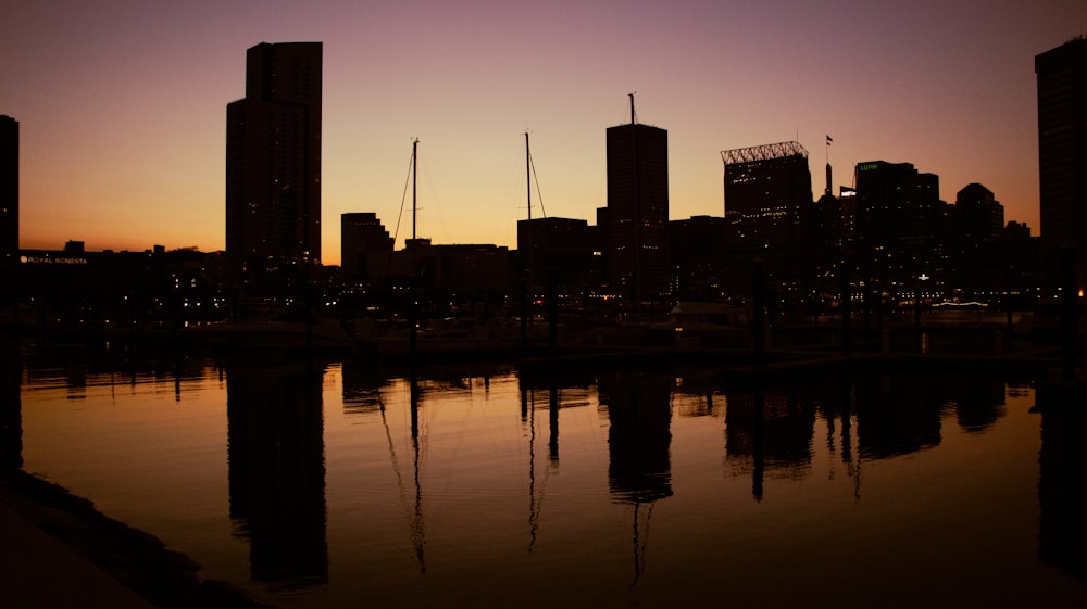 a view of a city skyline at sunset