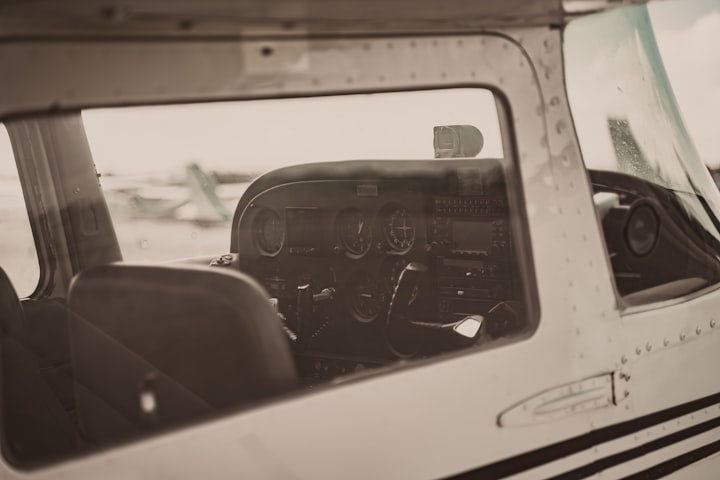 Cessna cockpit seen through the pilot-side window &mdash; BasicMed and Aircraft Insurance article by Tricrest Insurance