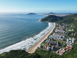 a bird's eye view of a beach and ocean