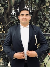 A professional lawyer standing confidently in front of a courthouse, ready for a case.