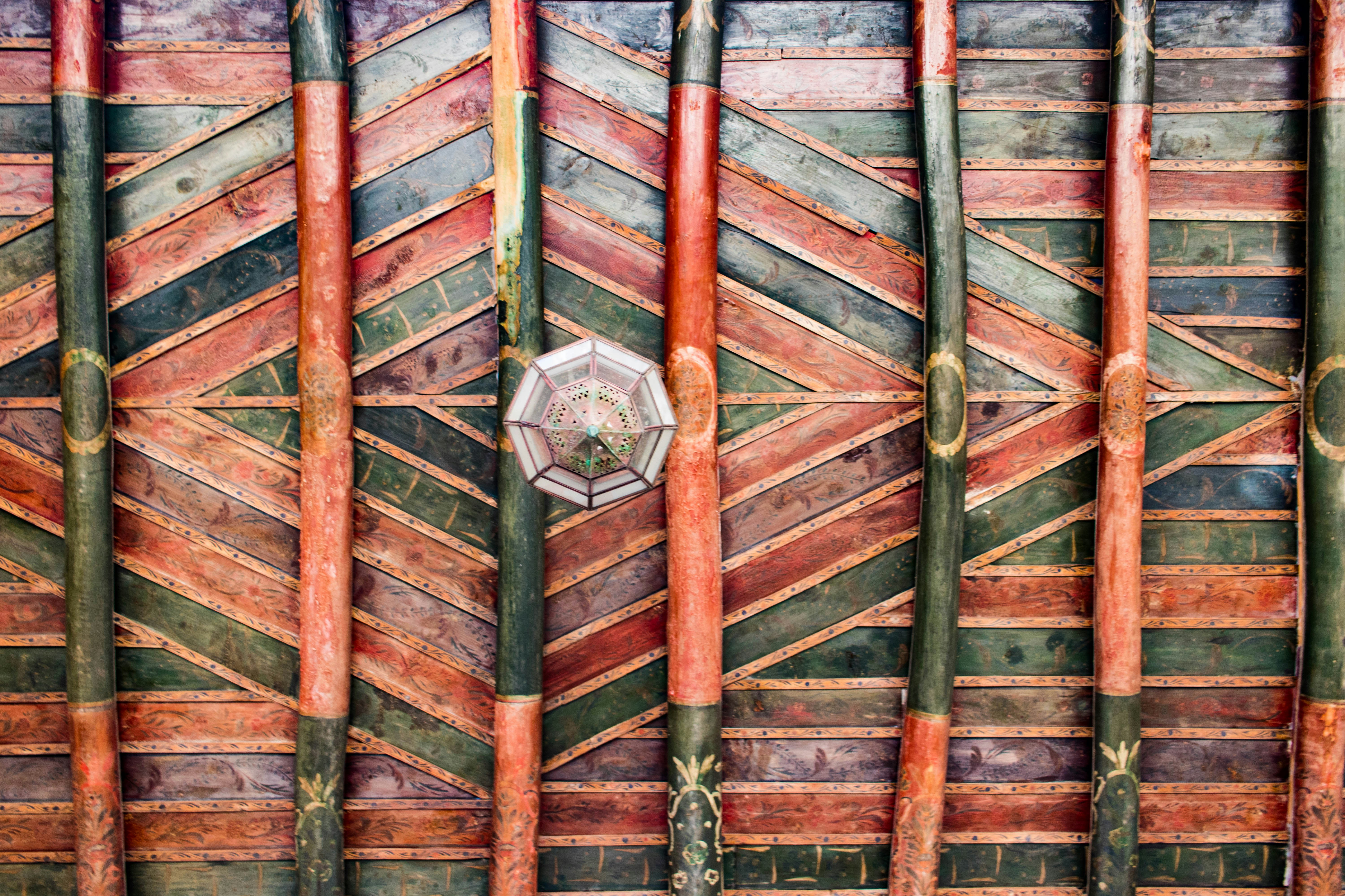 a close up of a wall made of bamboo sticks