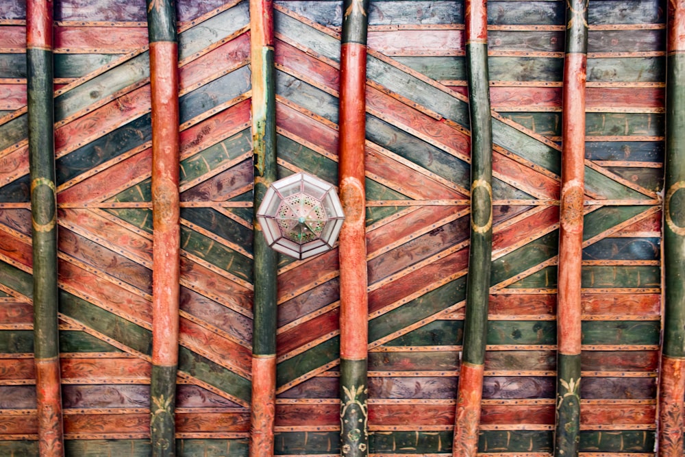 a close up of a wall made of bamboo sticks