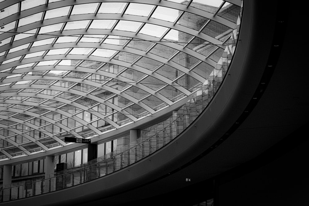 a black and white photo of a glass roof
