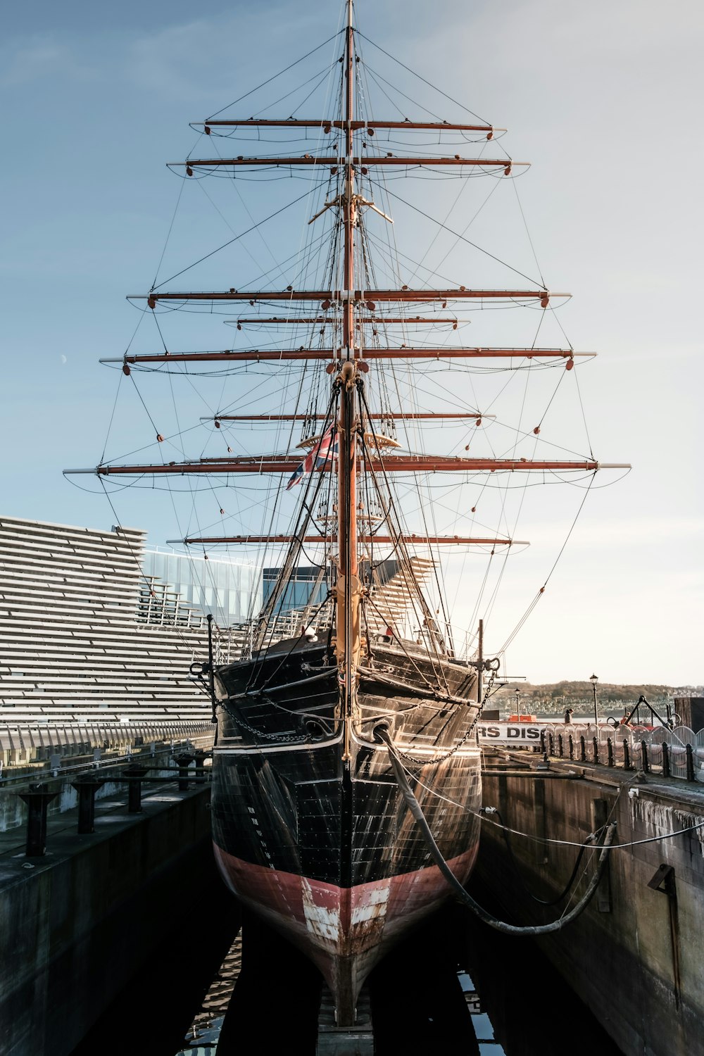 a large boat sitting in a dry dock