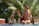 Couple enjoying a relaxing moment in a private jacuzzi room with warm lighting