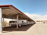 a row of rvs parked in a parking lot