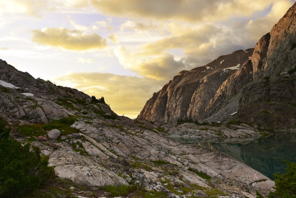 a mountain with a lake in the middle of it