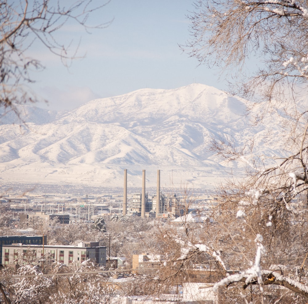 a view of a snowy mountain range from a distance