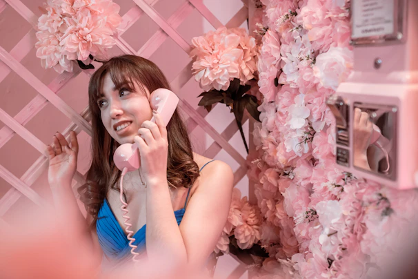 Close-up of a Purplerose team member expertly handling inbound calls with a friendly smile.