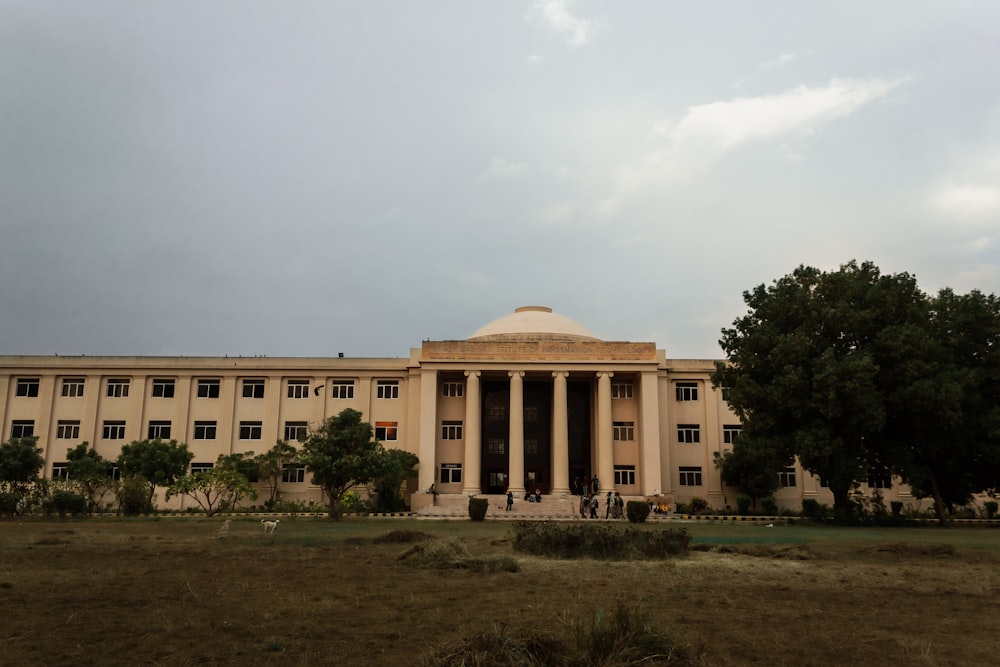 a large building with columns and columns on the front of it