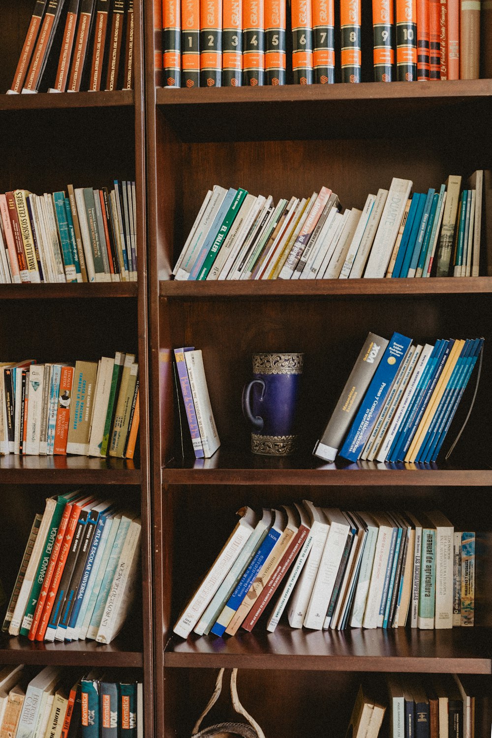 a book shelf filled with lots of books