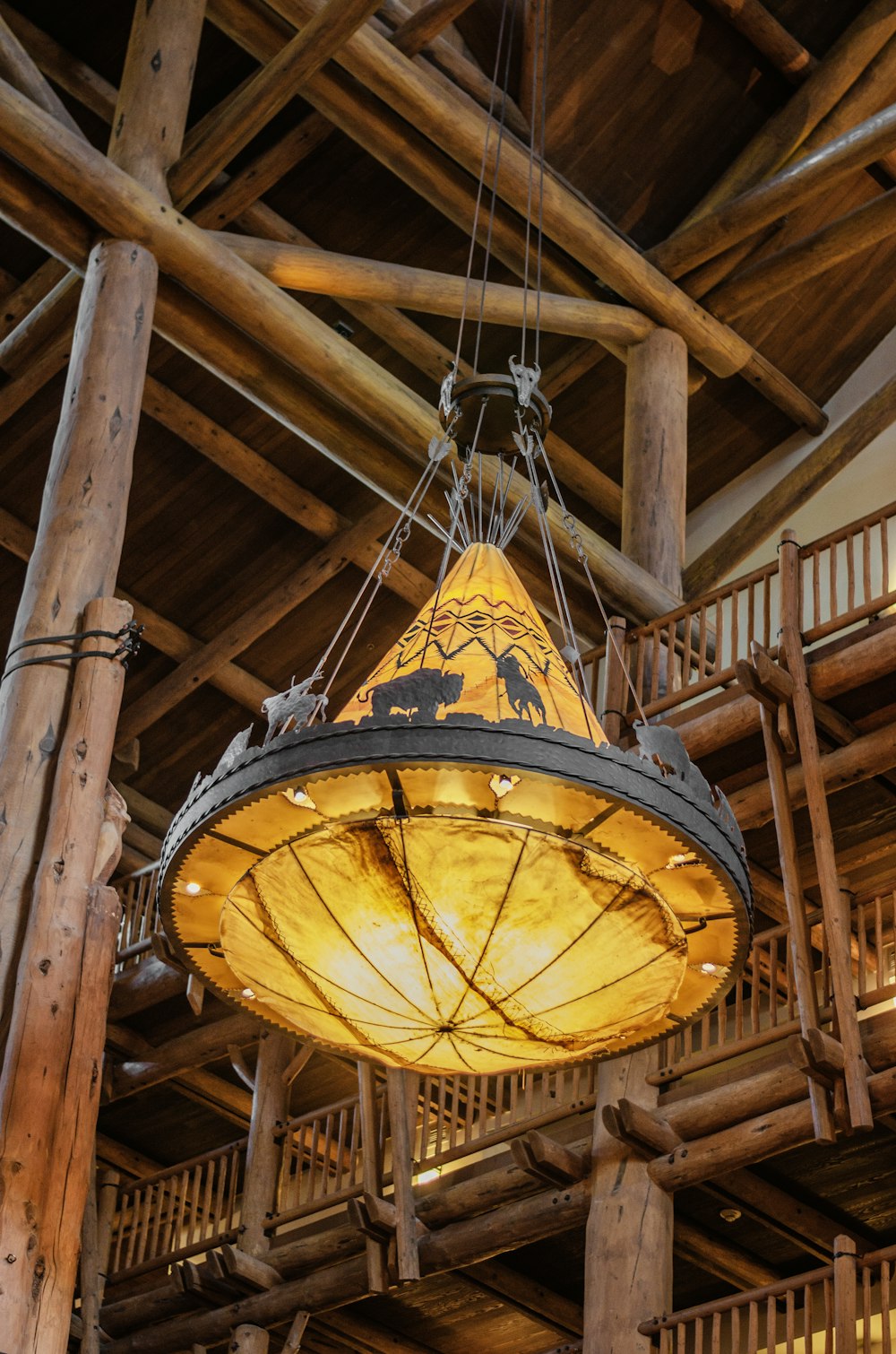 a lamp hanging from the ceiling of a building