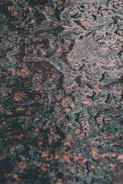 Before and after images of a waterproofed surface.