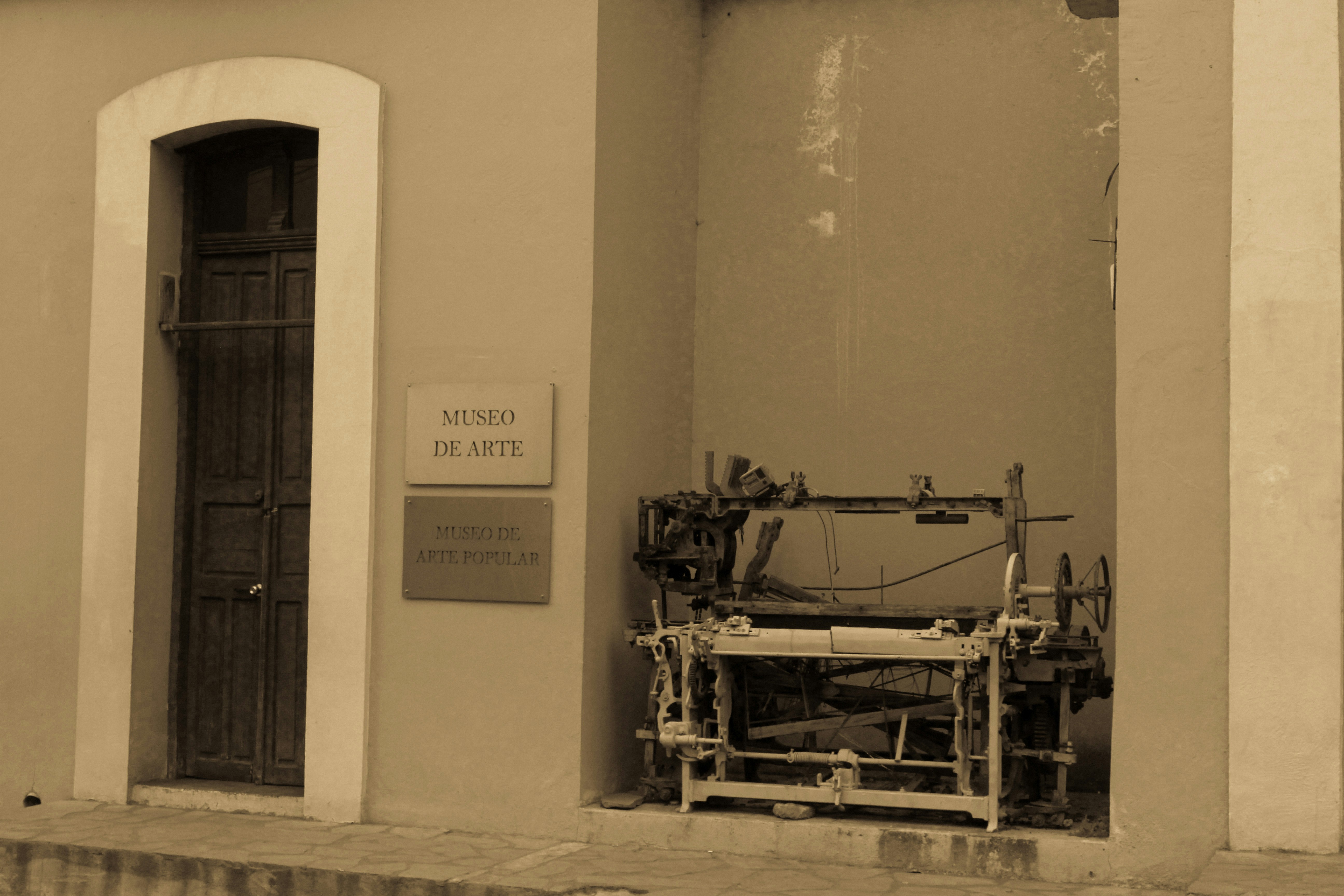a building with a machine in front of it