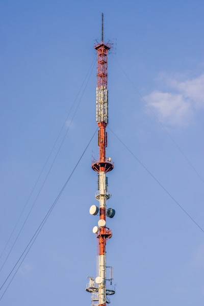 a very tall tower with a lot of antennas on top of it