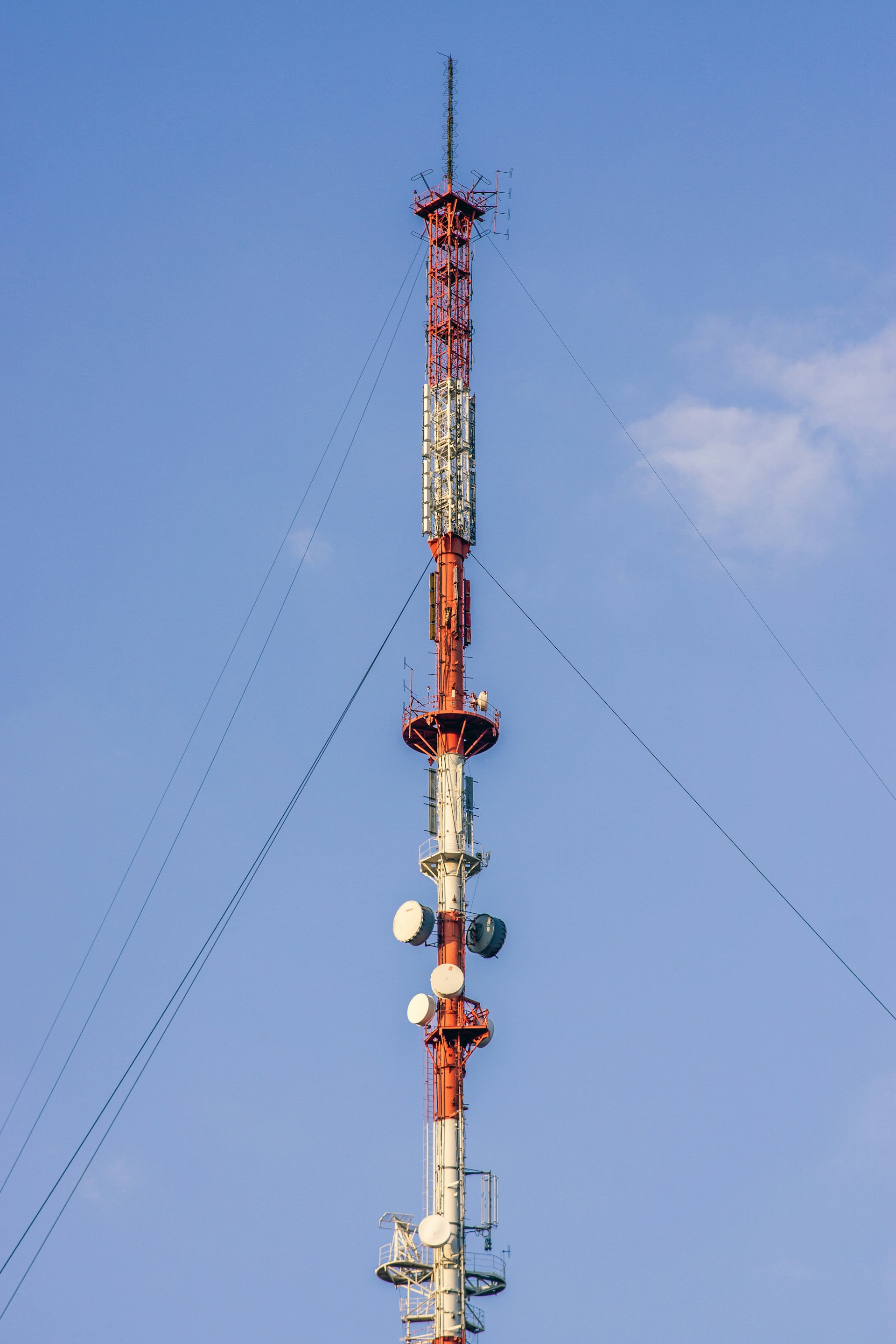 a very tall tower with a lot of antennas on top of it