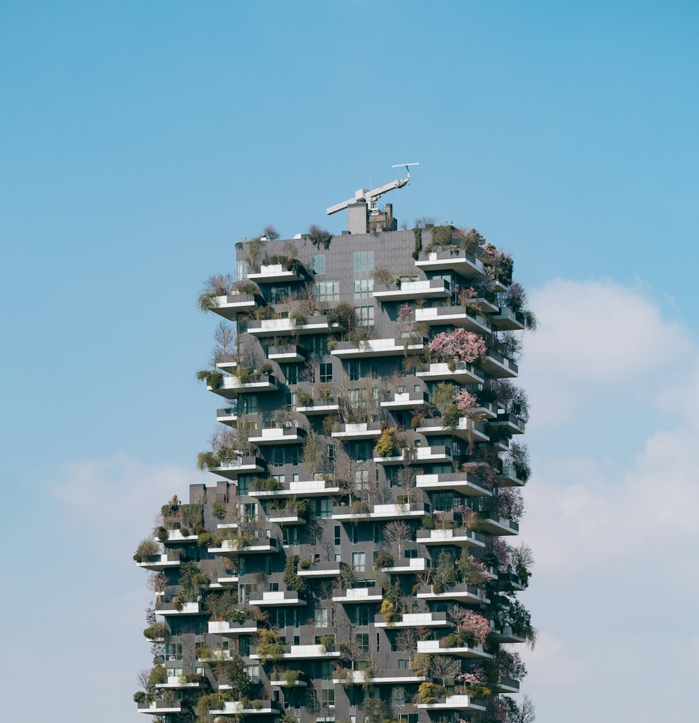 a very tall building with lots of windows and balconies