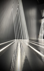 Abstract architectural lines converging to symbolize structured transformation and disciplined execution.