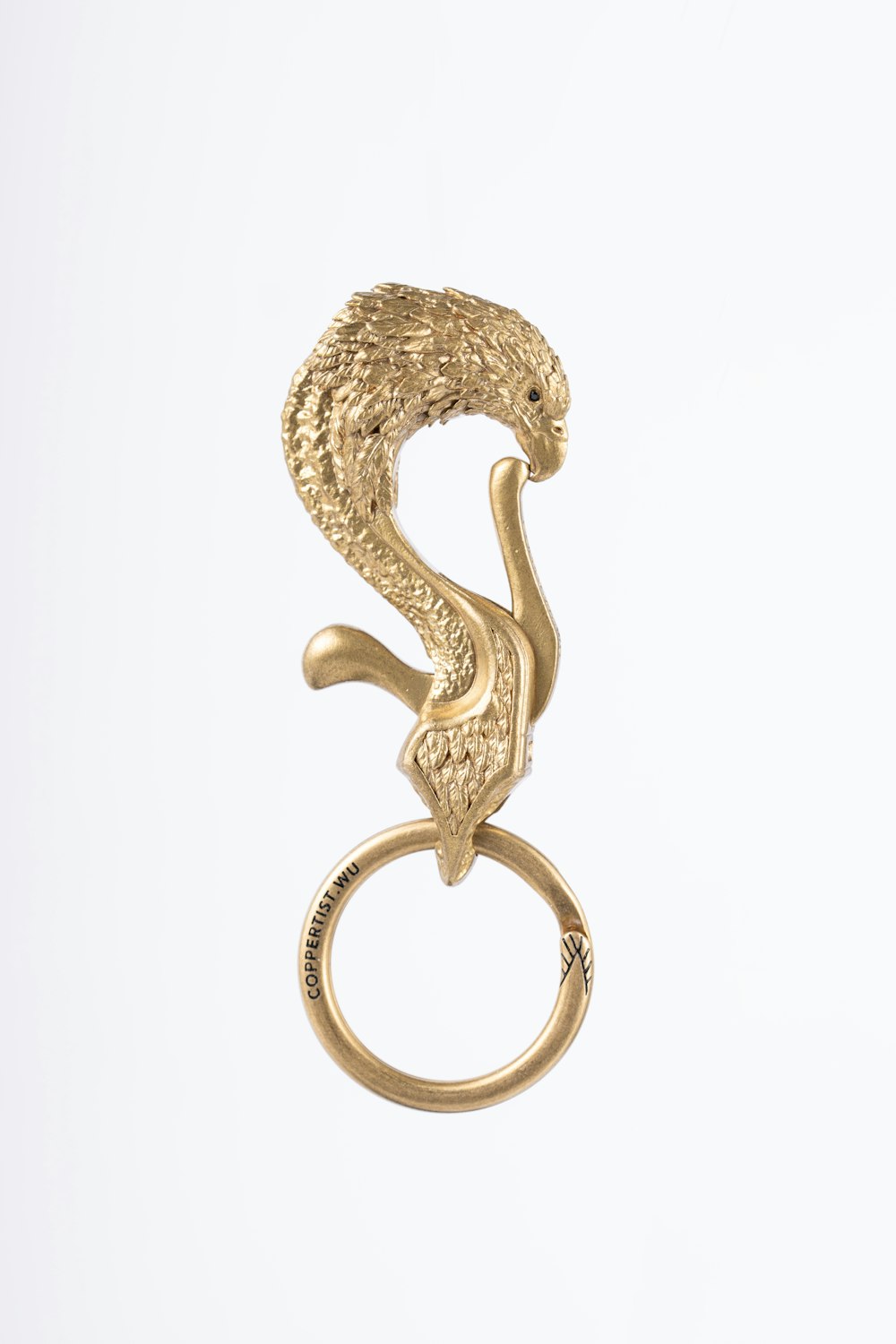 a gold ring with a snake on it