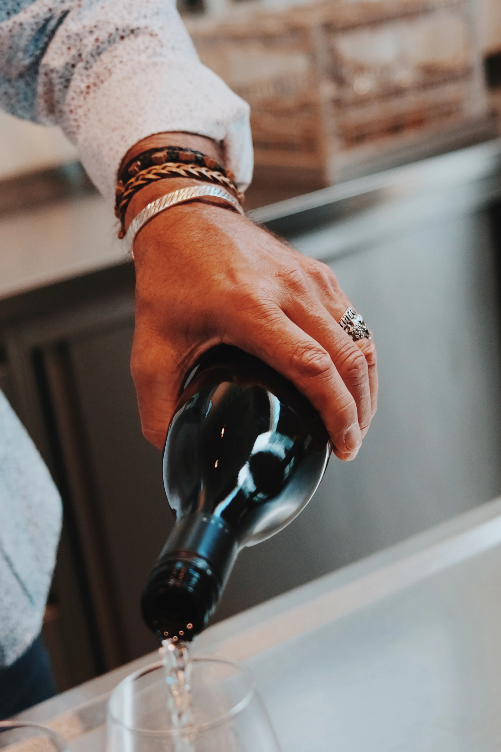 Travel photograph: Wine being poured into a clear glass at a table in Krems an der Donau.
