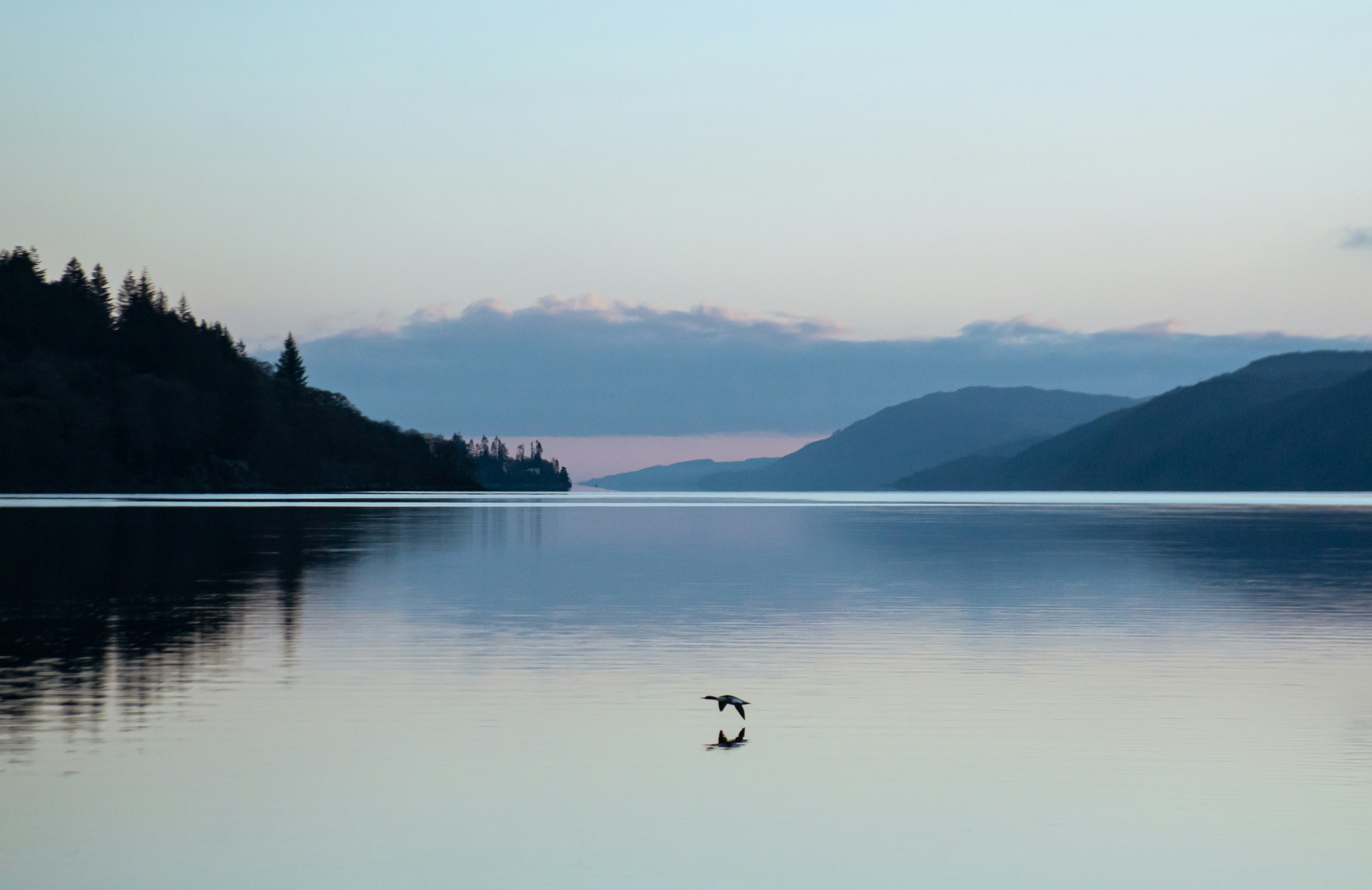 a large body of water surrounded by mountains