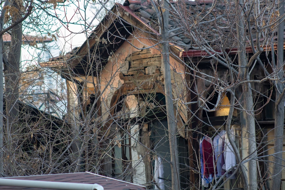 a house with a clock on the front of it