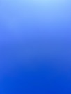 an airplane flying in the sky with a blue background