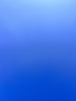 an airplane flying in the sky with a blue background