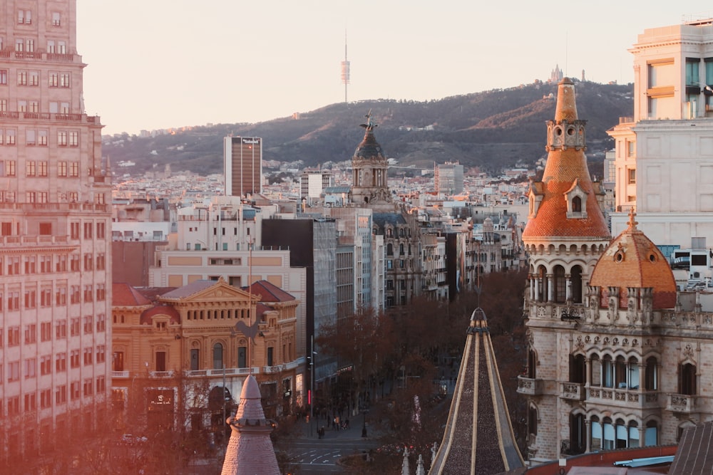 a view of a city with tall buildings