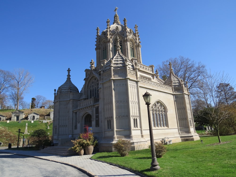 a large church with a steeple and a clock tower