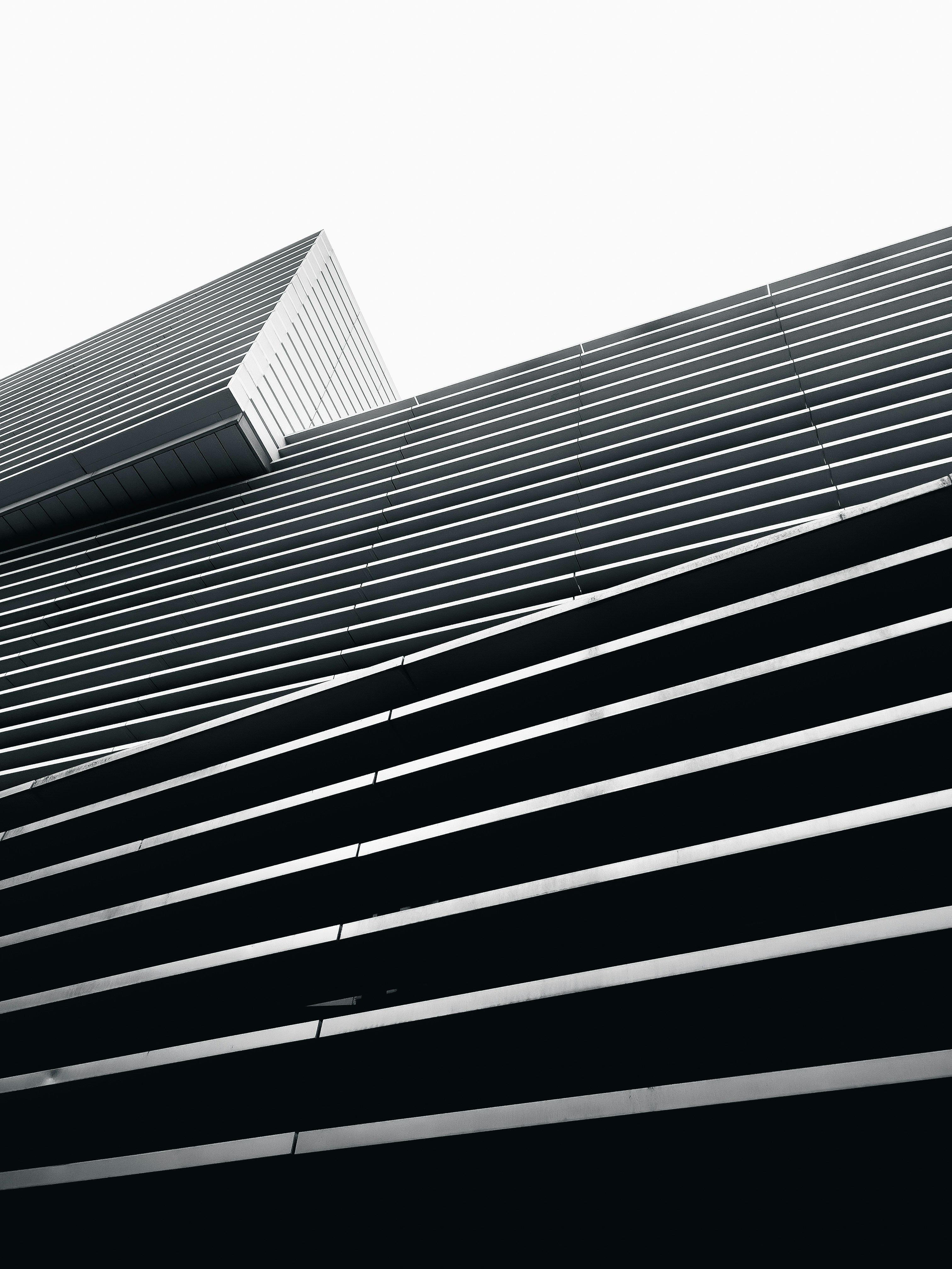 a black and white photo of a tall building