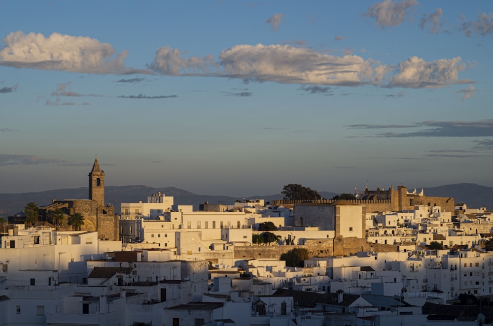 a view of a city with a clock tower