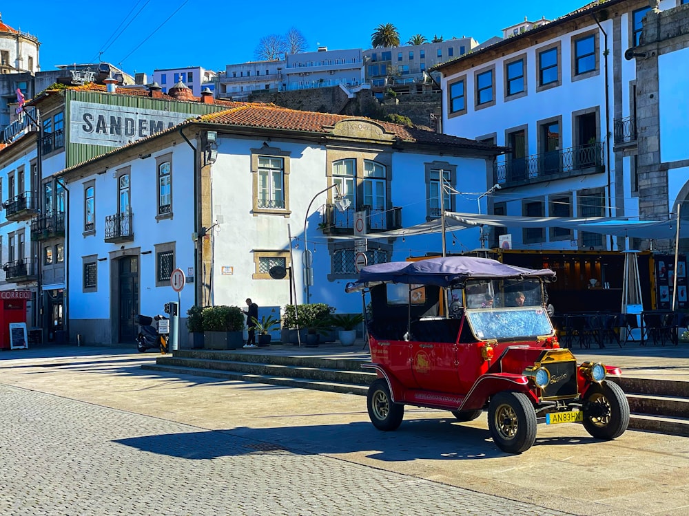 a small car parked on the side of the road