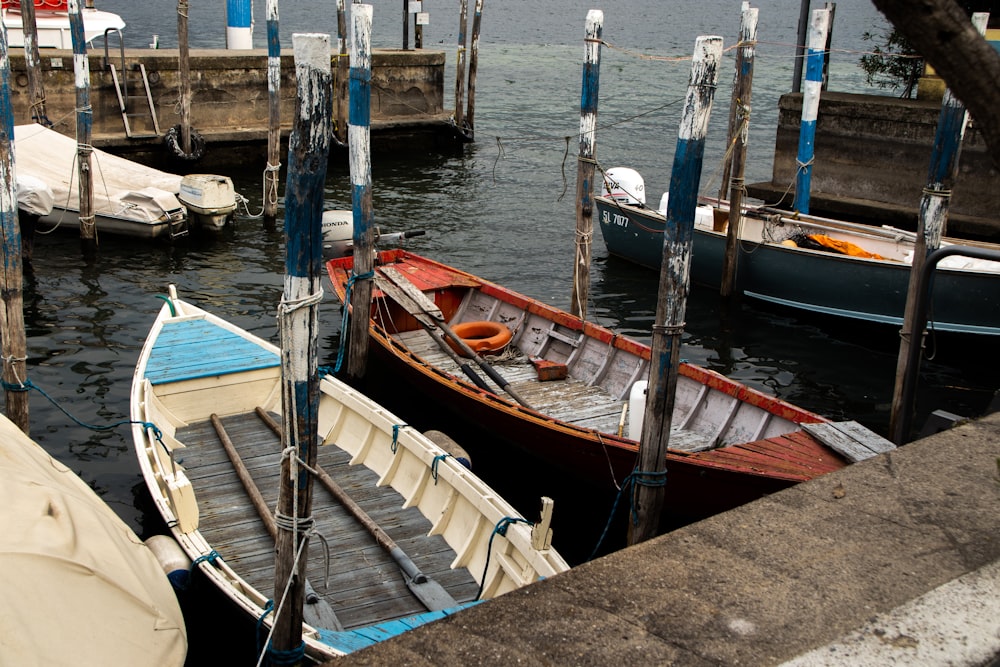 a couple of boats that are sitting in the water