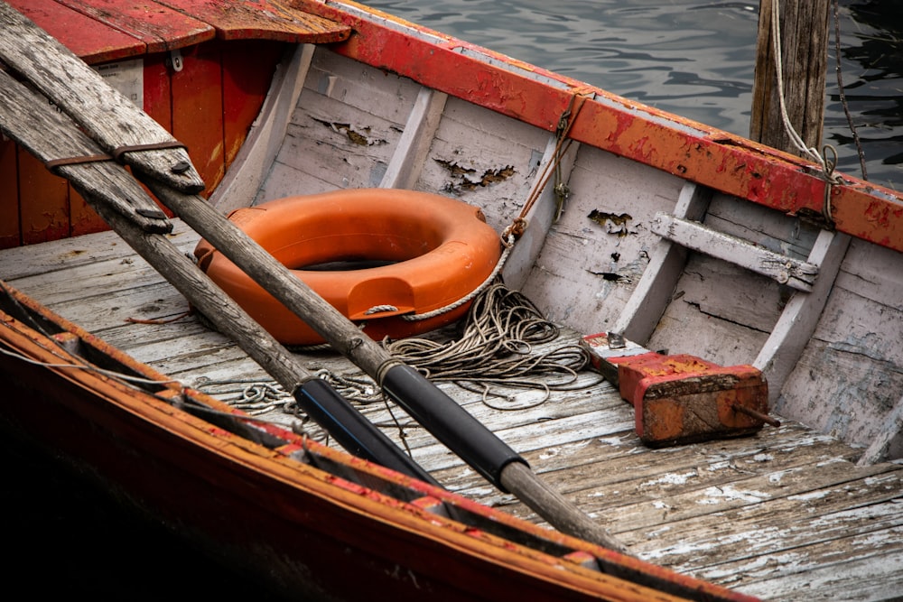 a boat with a life preserver on the front of it