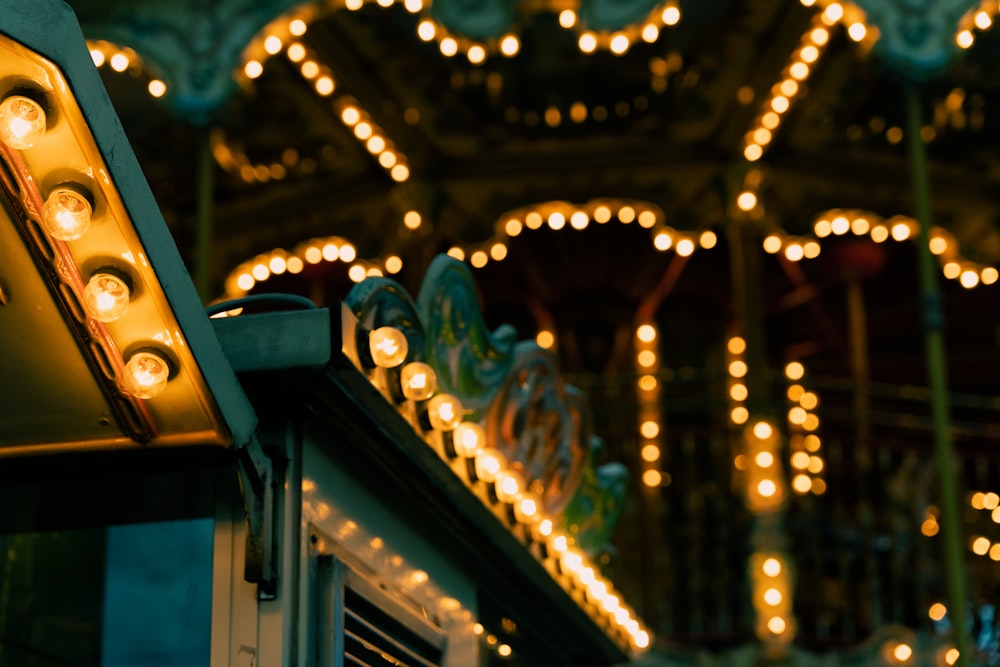 a merry go round with lights on it