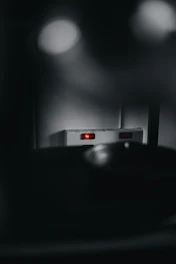 Encrypted communication devices glowing with secure data transmissions in a dark setting.