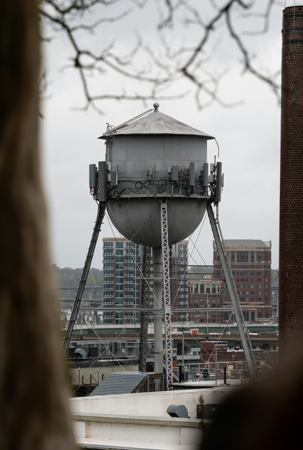 a water tower in the middle of a city