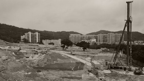 A construction site showcasing skilled workers and modern equipment.