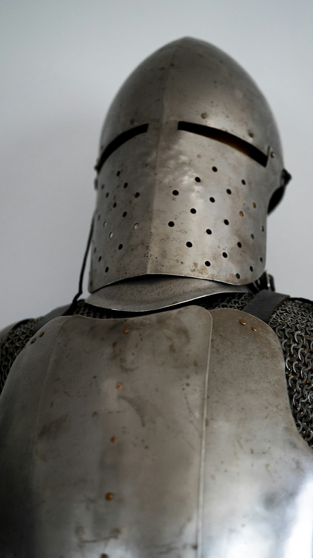 a close up of a knight's armor on a white background