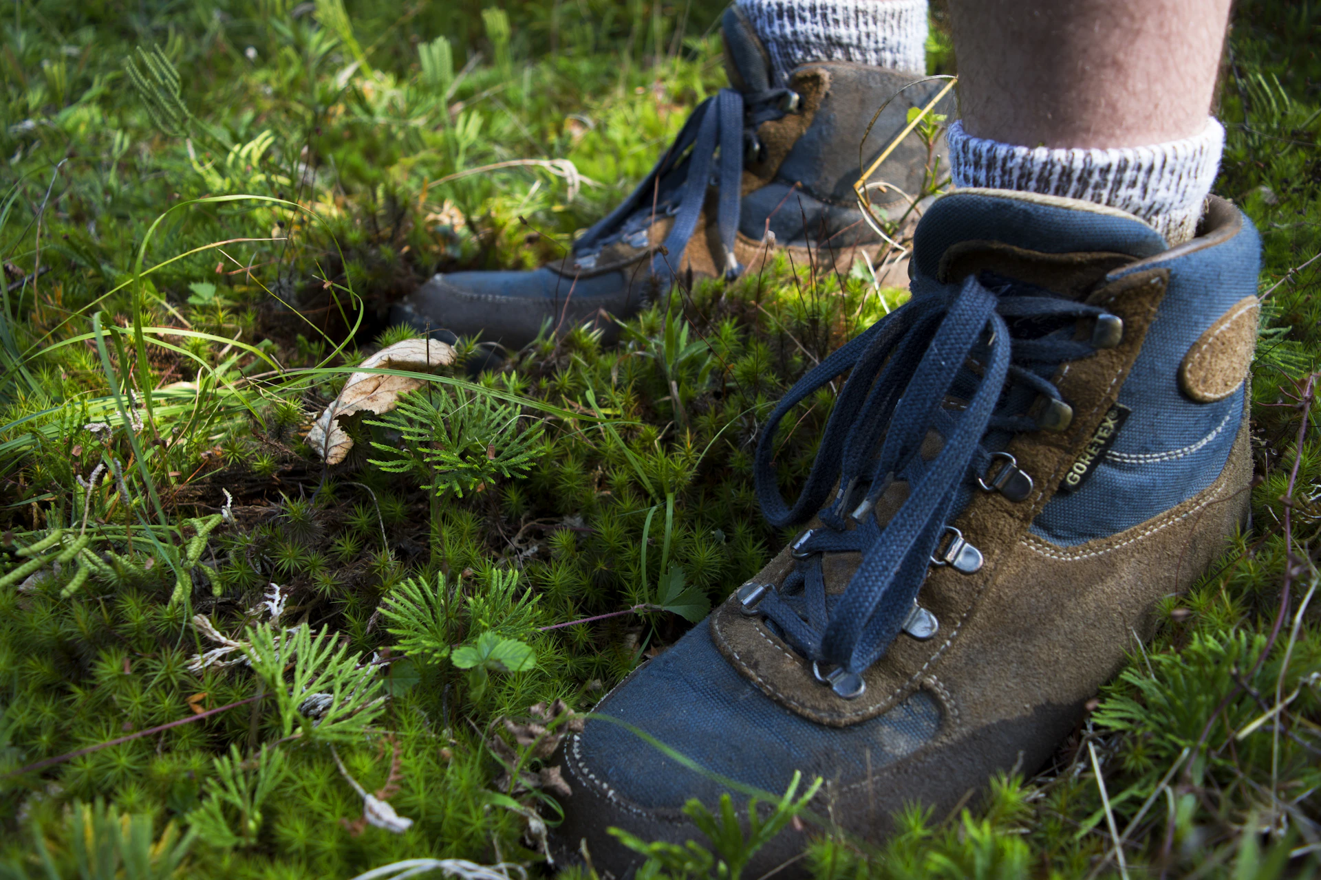 woman wearing yellow long-sleeved dress under white clouds and blue sky during daytime