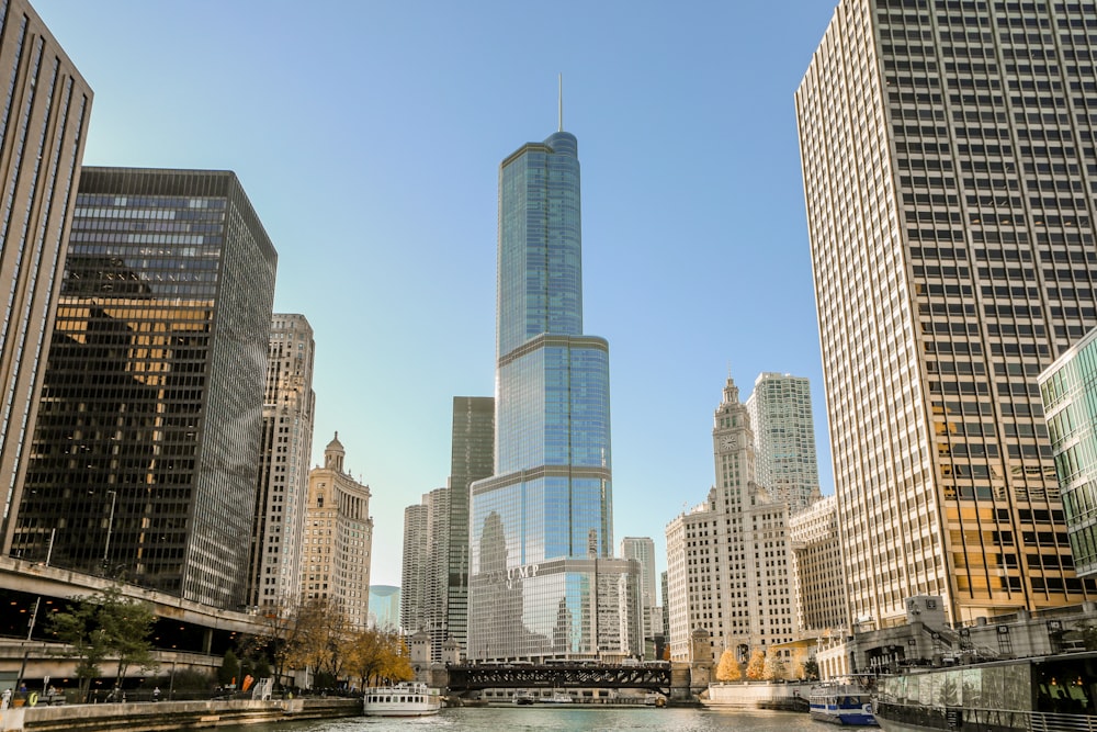 a river running through a city with tall buildings