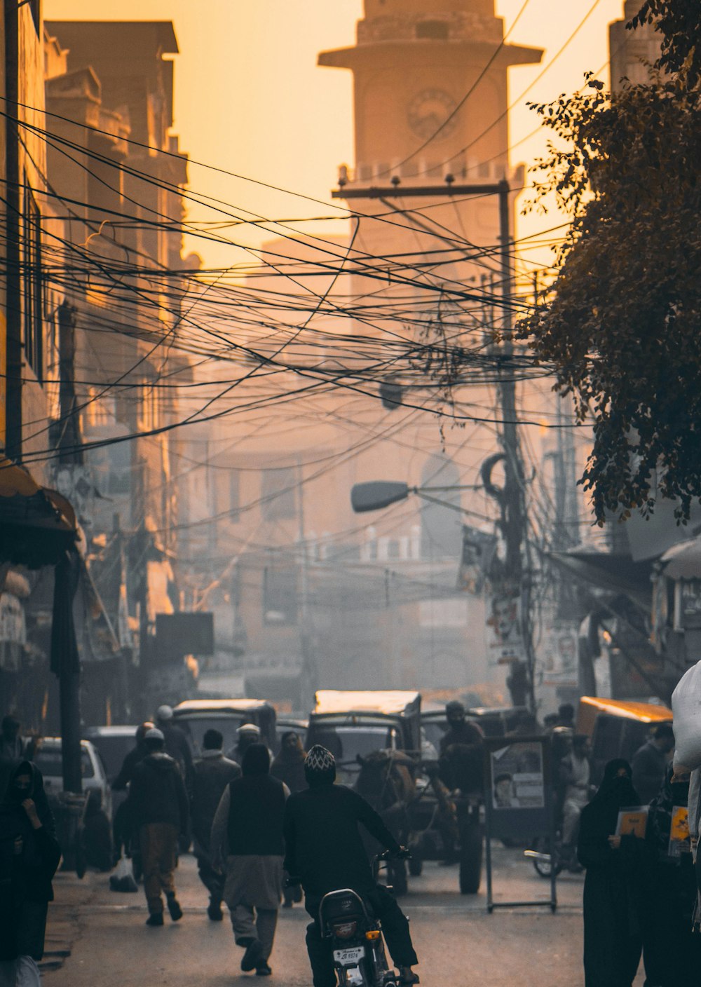 a group of people walking down a street