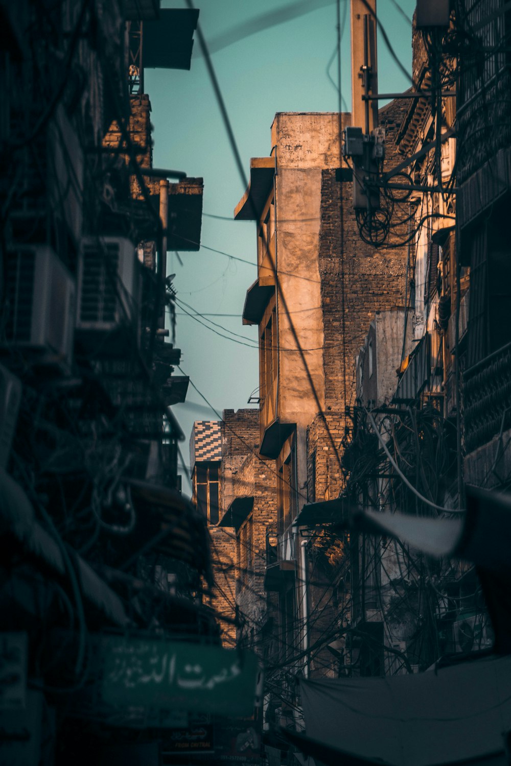 a city street filled with lots of tall buildings