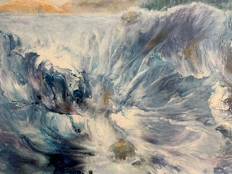 An abstract painting inspired by ocean waves and sandy shores.